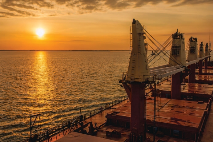 Dry bulk ship, sunset